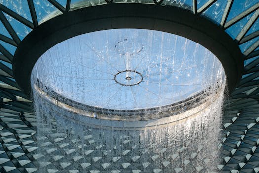 Stunning perspective of the iconic Jewel Changi Airport waterfall in Singapore.