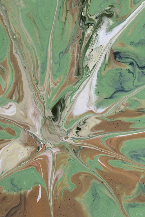 Free Captivating abstract fluid art featuring swirling green and brown colors with a touch of white. Stock Photo