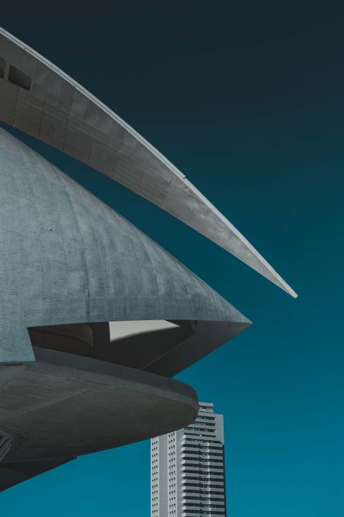 Free Striking architectural structures against a clear blue sky in València, Spain. Stock Photo