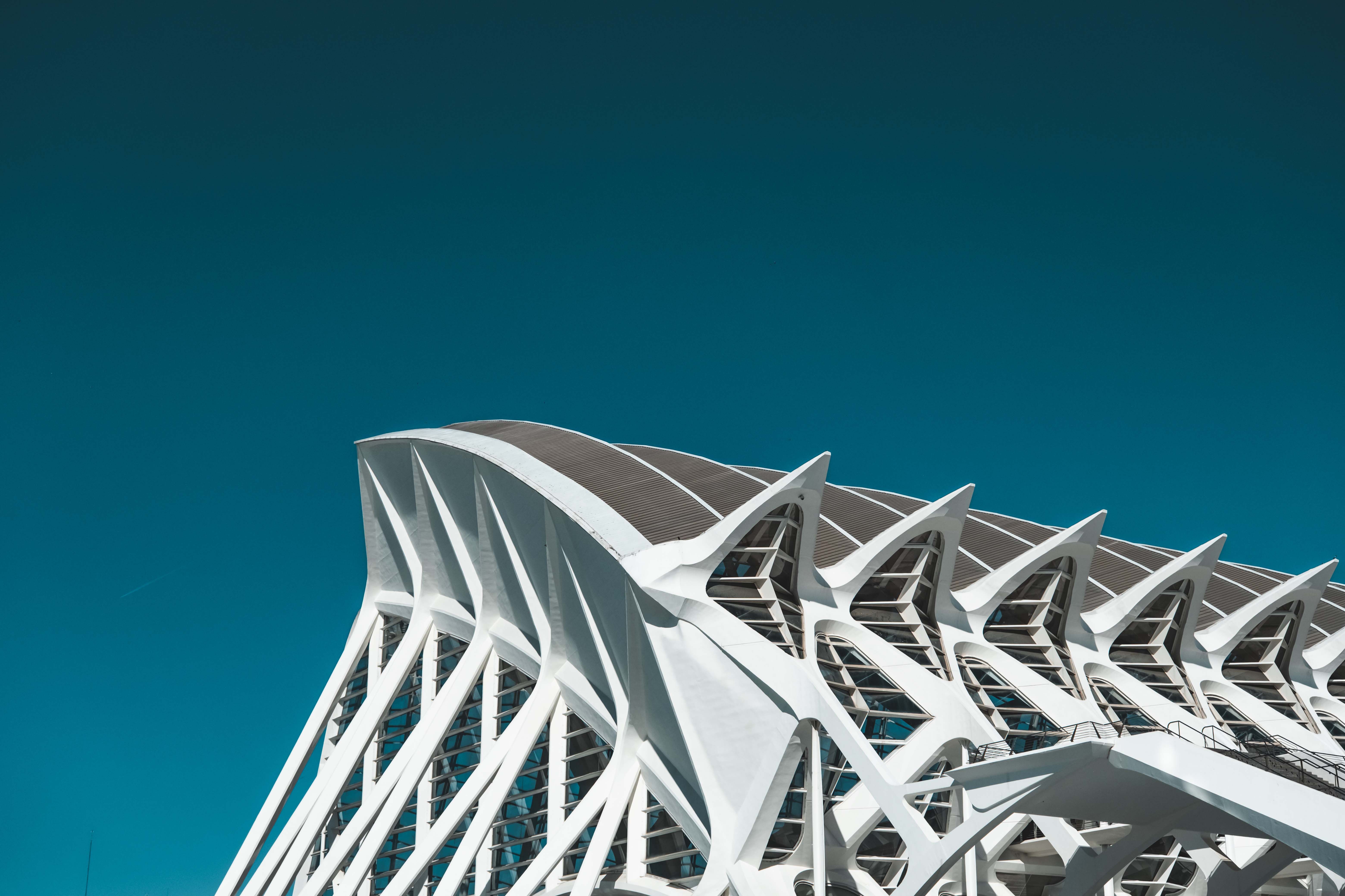 Stunning architectural detail of the Science Museum in Valencia, Spain under a clear blue sky.