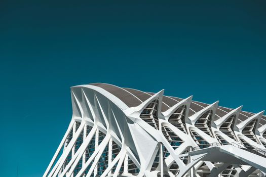Stunning architectural detail of the Science Museum in Valencia, Spain under a clear blue sky.