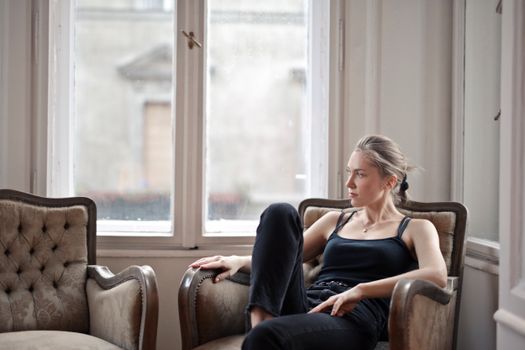 Woman Sitting on Chair