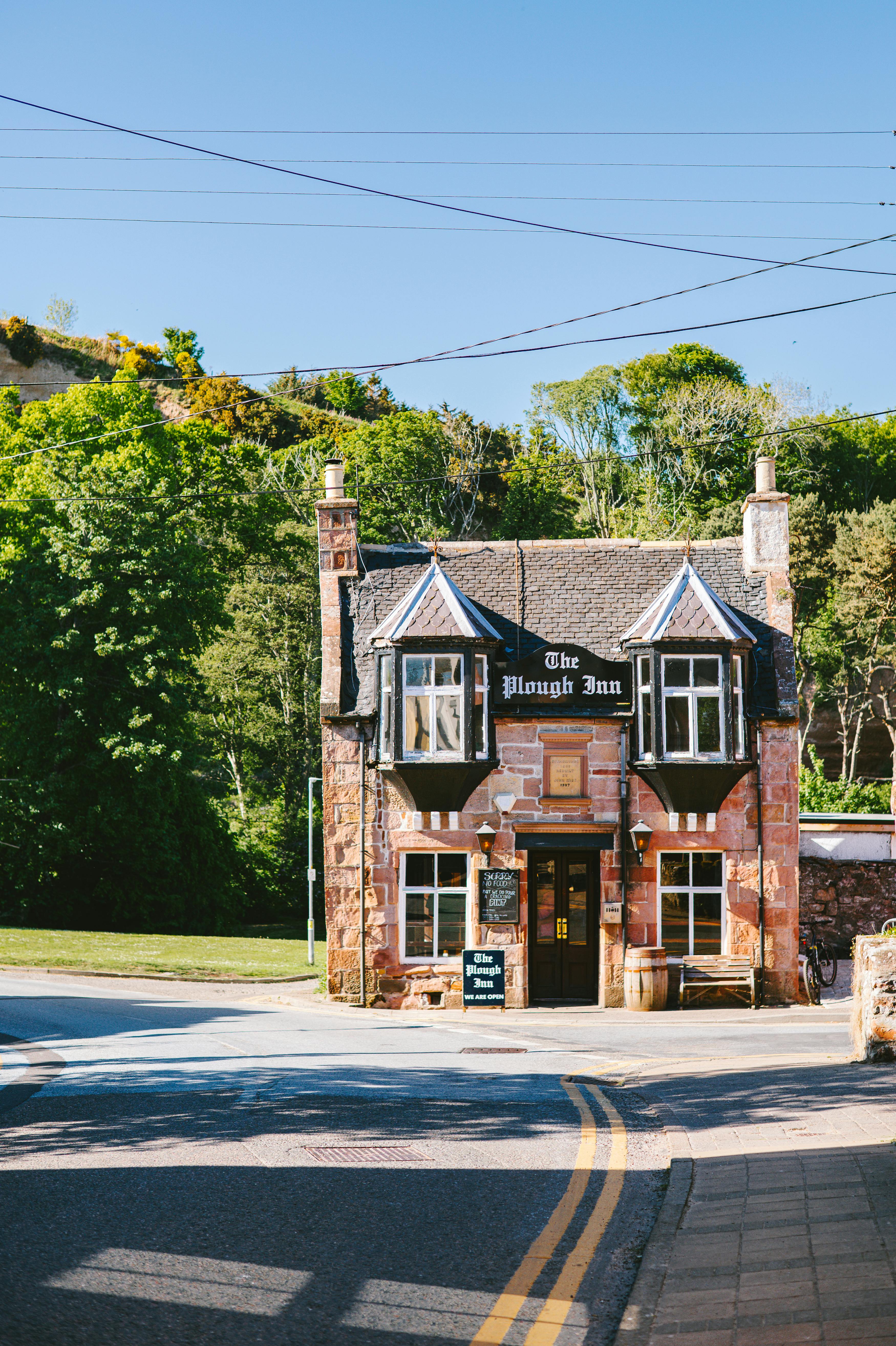Explore the quaint charm of The Plough Inn, a traditional Scottish pub in Fortrose.
