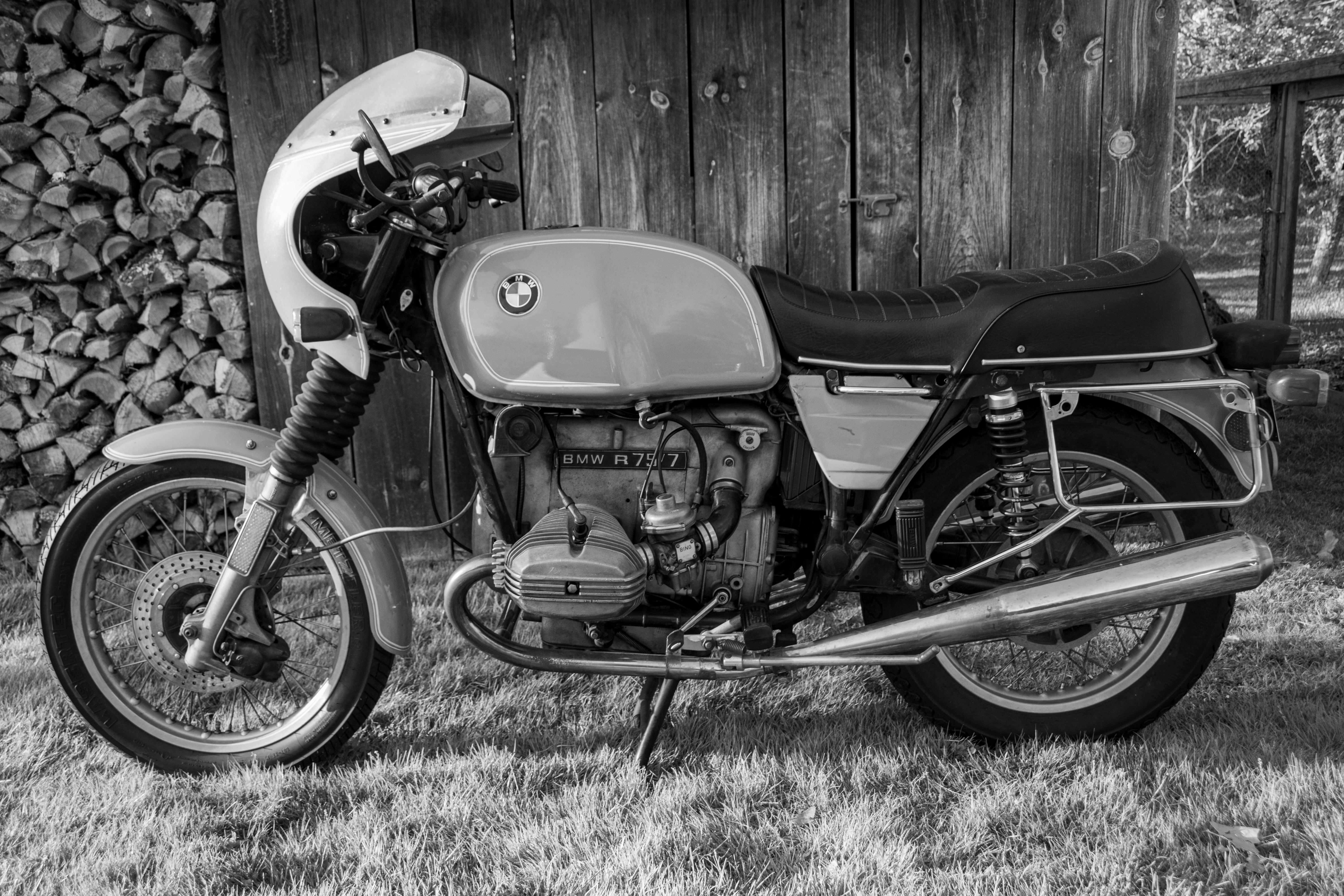Free Classic BMW motorcycle in a monochromatic style against wooden background. Stock Photo