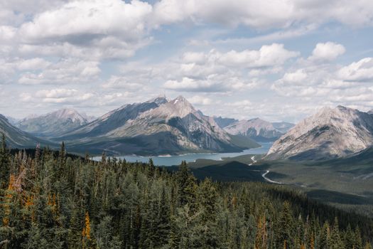 Stunning view of the Canadian Rockies and alpine lake in Kananaskis, Alberta.