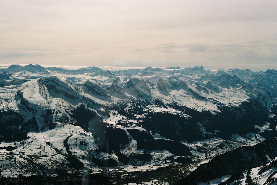 Ultimate Matterhorn Helicopter Tour - Longest Scenic Flight from Bern Over the Swiss Alps Review Review 2026 - Spectacular aerial view of snow-covered Alpine mountain range under a serene sky.
