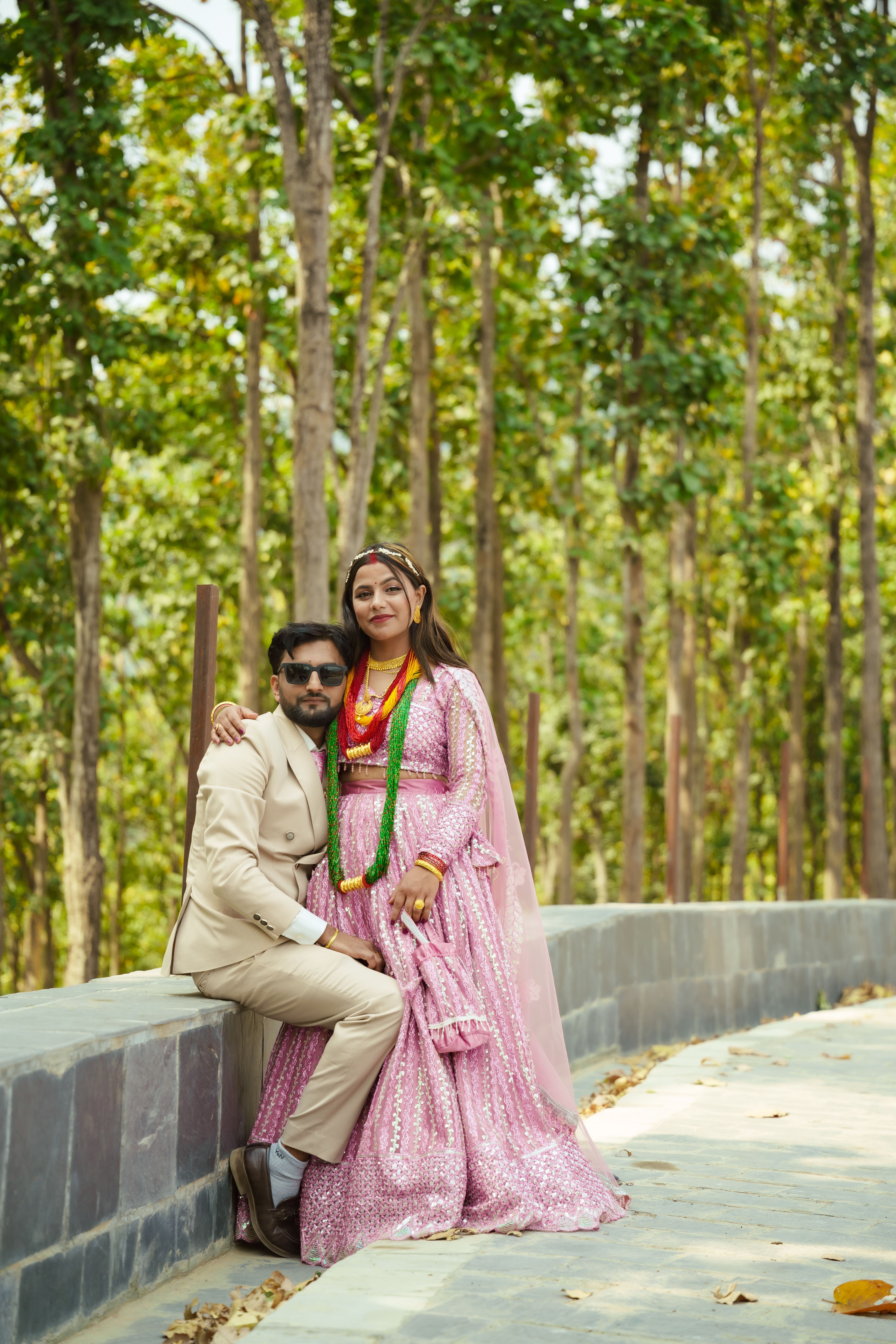 Couple in Traditional Attire Posing Outdoors · Free Stock Photo