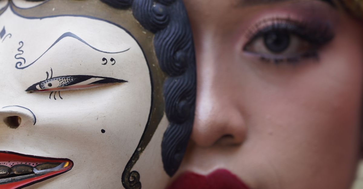 Java Dancer Mask Traditional Javanese Dancer with Decorative Mask · Free Stock Photo
