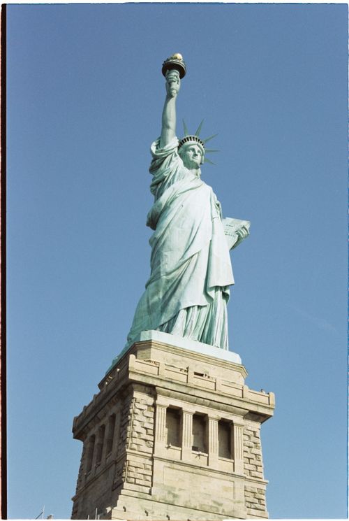 Free The Statue of Liberty stands majestically in New York City, symbolizing freedom. Stock Photo