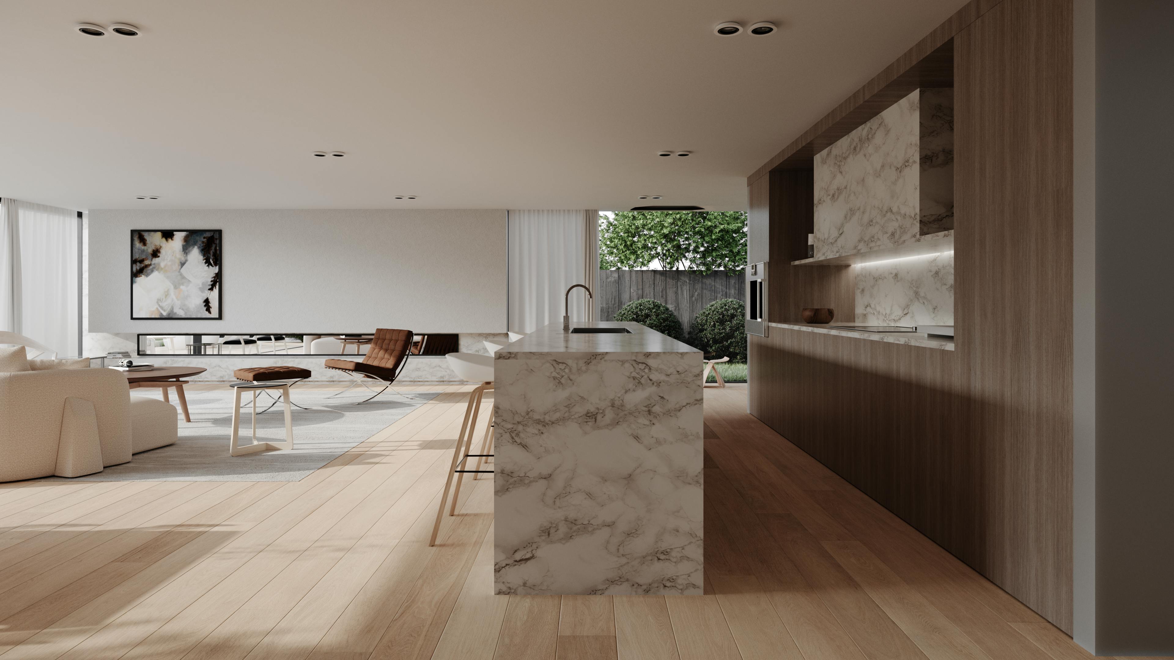 Stylish modern kitchen and living room with marble countertops and open design.
