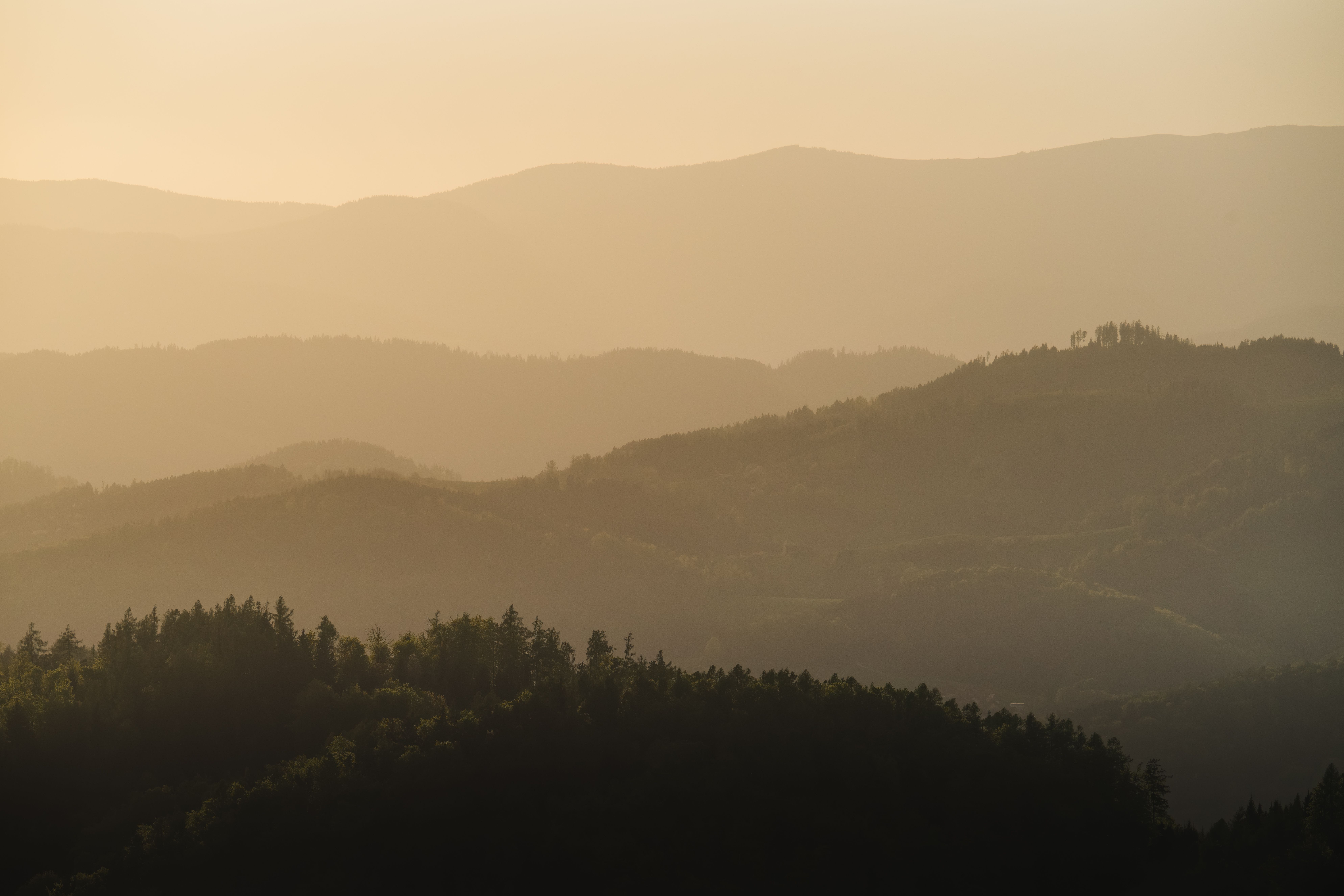 Serene Layers of Graz Mountains at Sunset · Free Stock Photo