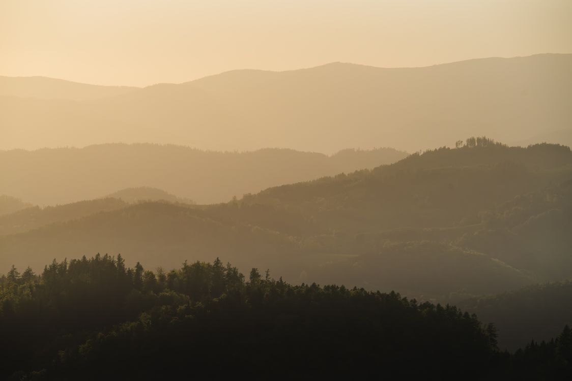 Graz Sunset Serene Layers of Graz Mountains at Sunset · Free Stock Photo