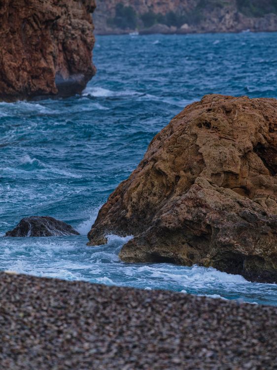 Photos Ruggged Rocks Rugged Coastal Rocks by the Blue Sea · Free Stock Photo