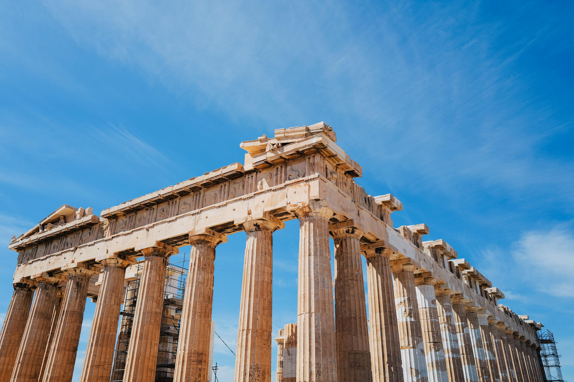 Iconic Parthenon Temple Under Bright Blue Sky