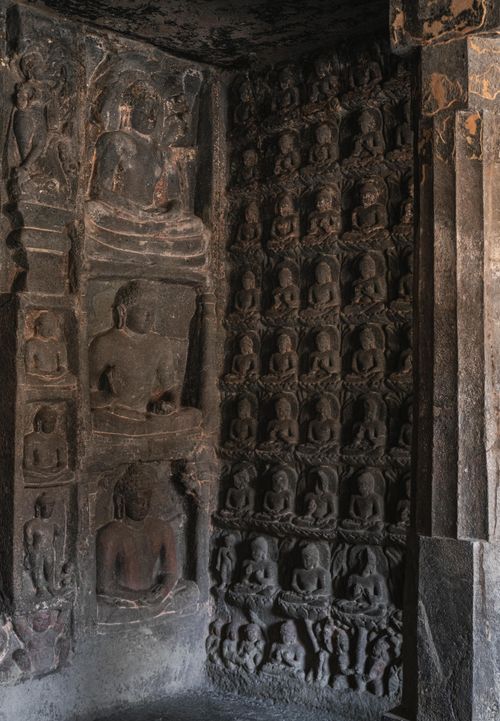 Free Historic stone carvings at Ajanta Caves, Maharashtra showcase ancient Buddhist art. Stock Photo