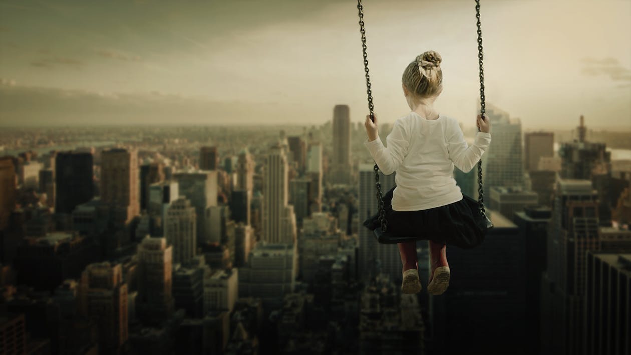 Free Woman Looking at Cityscape Stock Photo