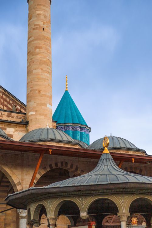 Free Scenic view of the Mevlana Museum's blue green dome in Konya, Turkey with clear sky. Stock Photo