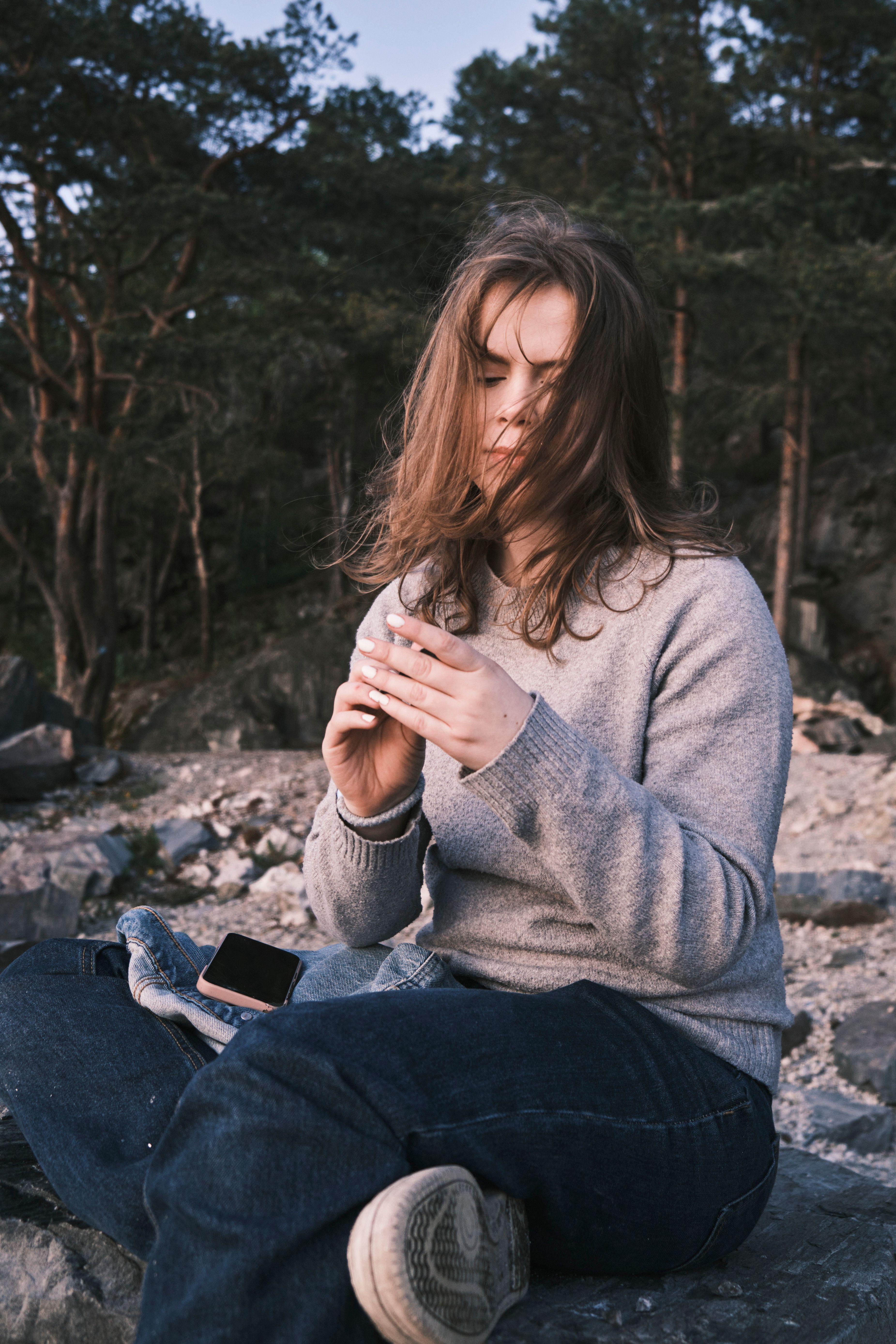 Young Woman Relaxing Outdoors in Nature · Free Stock Photo