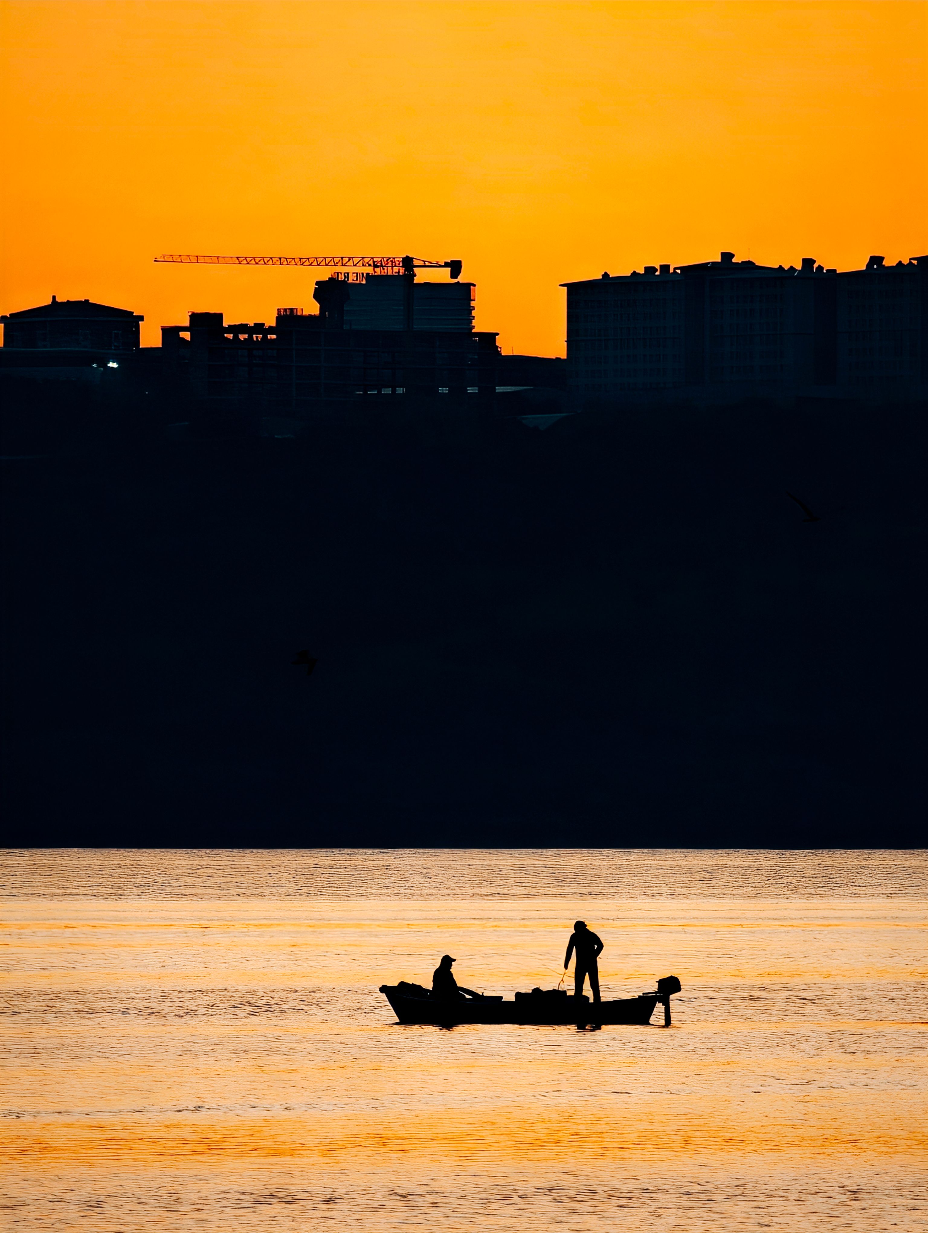 Silhouette of Fishermen at Sunset in Istanbul · Free Stock Photo