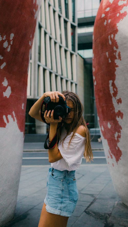 Photo Of Woman Holding Camera