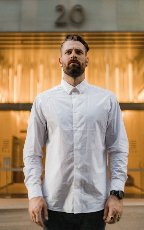 Free Selective Focus Photo of Man in White Dress Shirt Posing Stock Photo