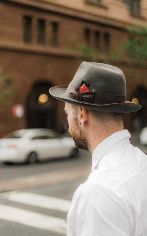 Free Man Wearing White Dress Shirt and Gray Cowboy Hat Stock Photo