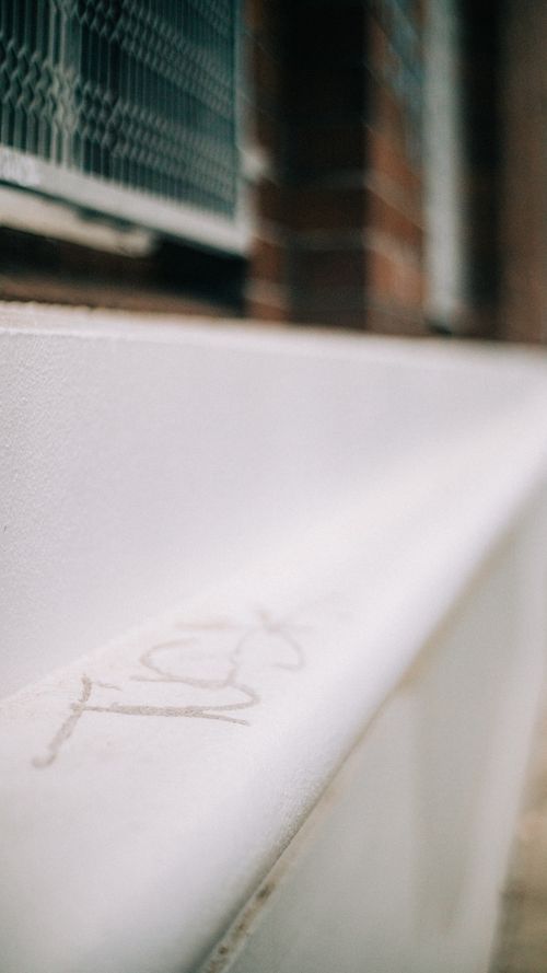 Free Close-up of an architectural surface with soft focus creating a textured abstract feel. Stock Photo