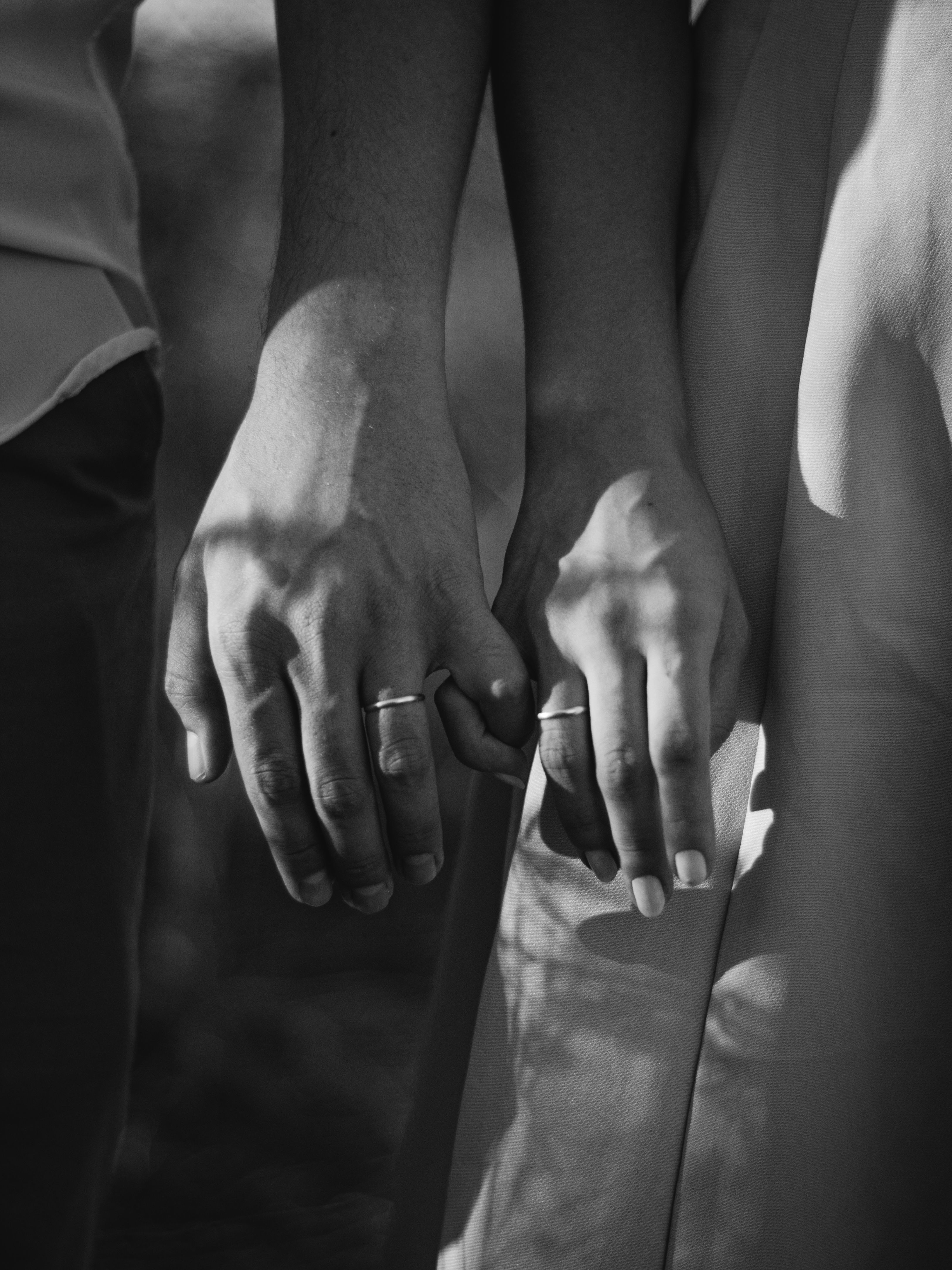 Romantic Black and White Couple Holding Hands · Free Stock Photo