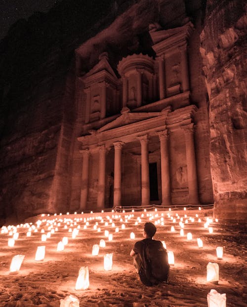 A Man Sitting Outside of the Famous Petra