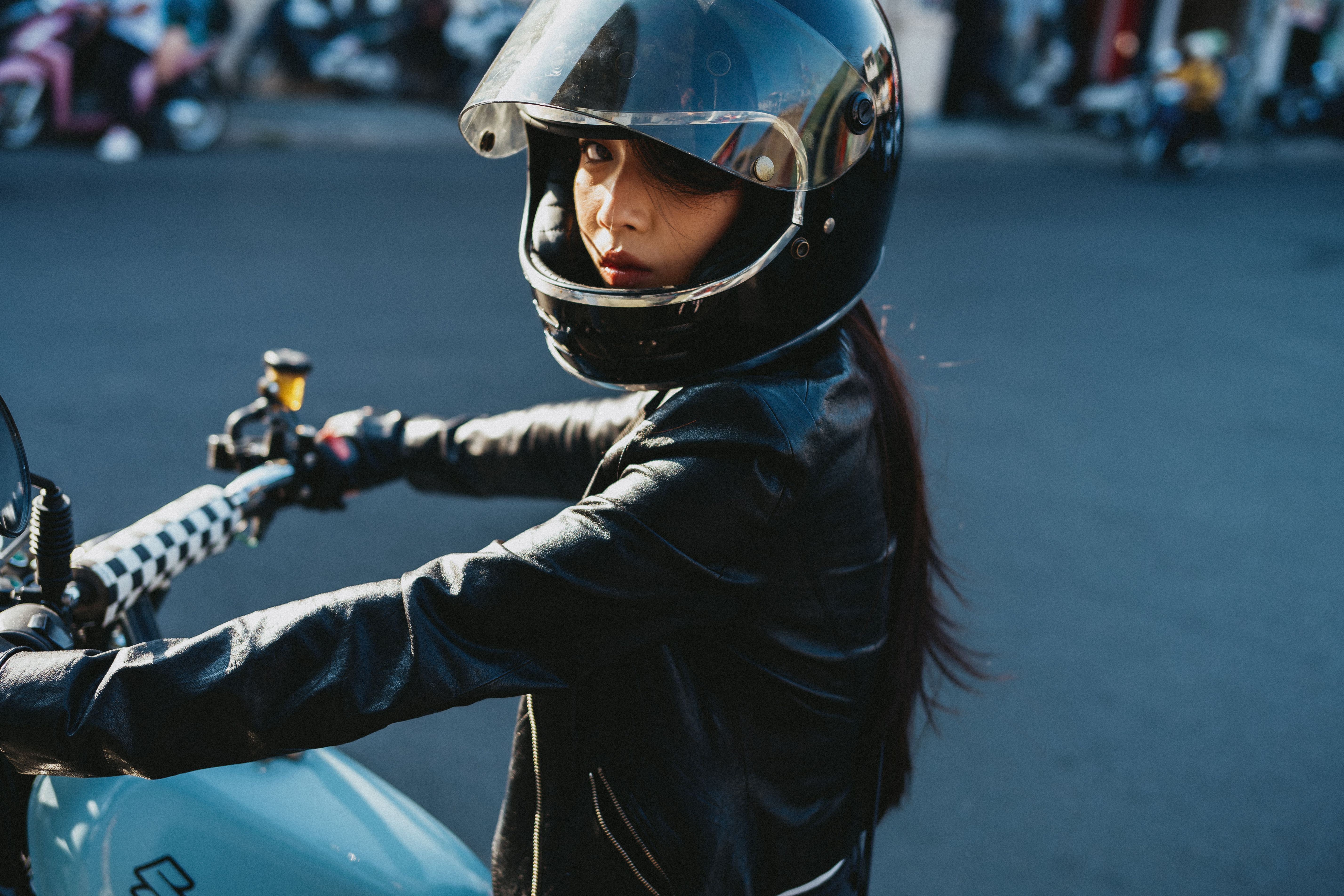 Woman Charged Motorcyclist