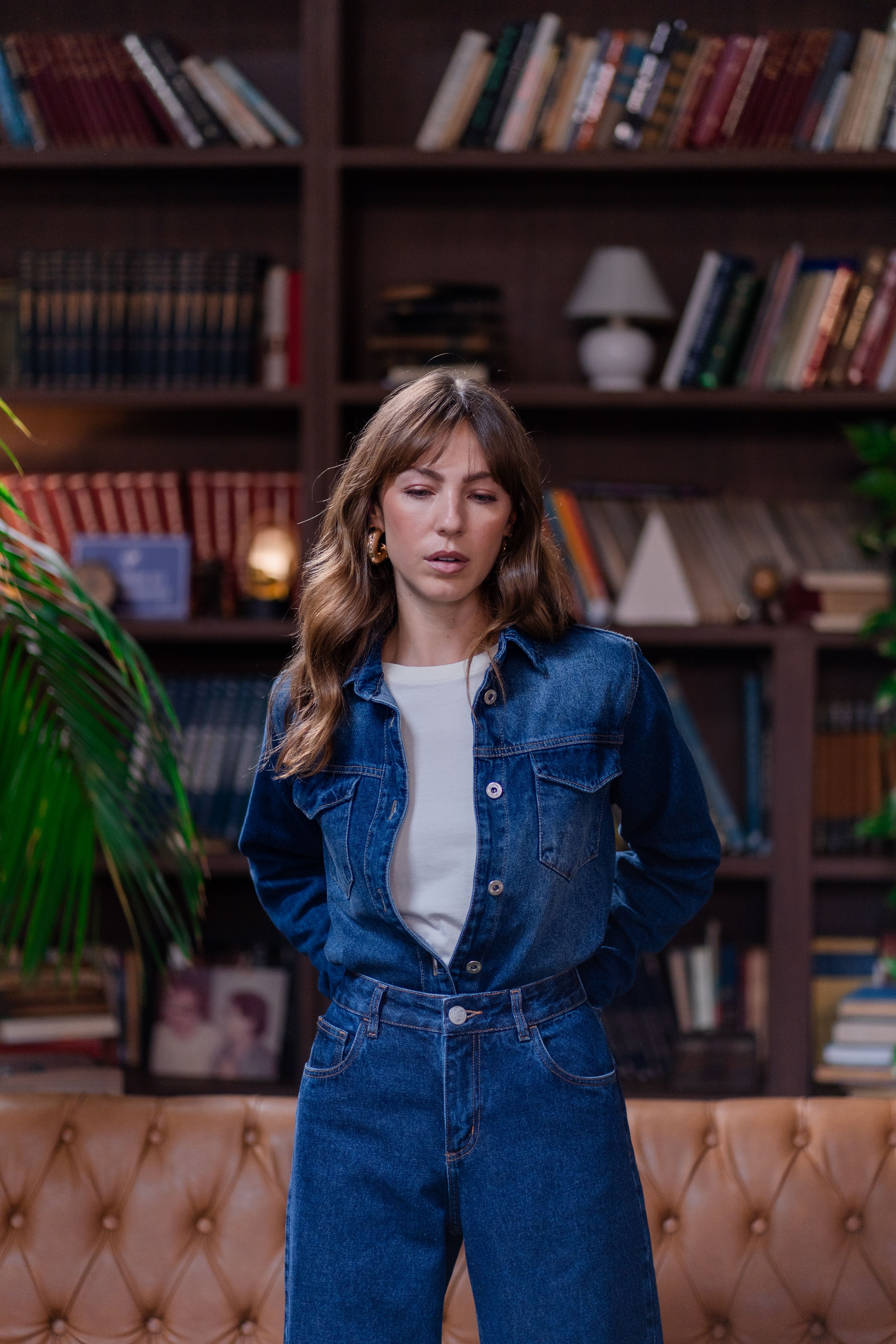 Woman wearing denim jacket with jeans