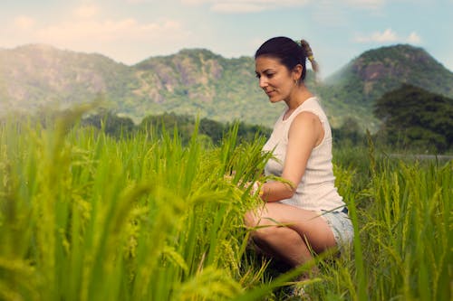 Free Woman in a Field Stock Photo