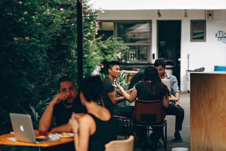 People Sitting At The Table