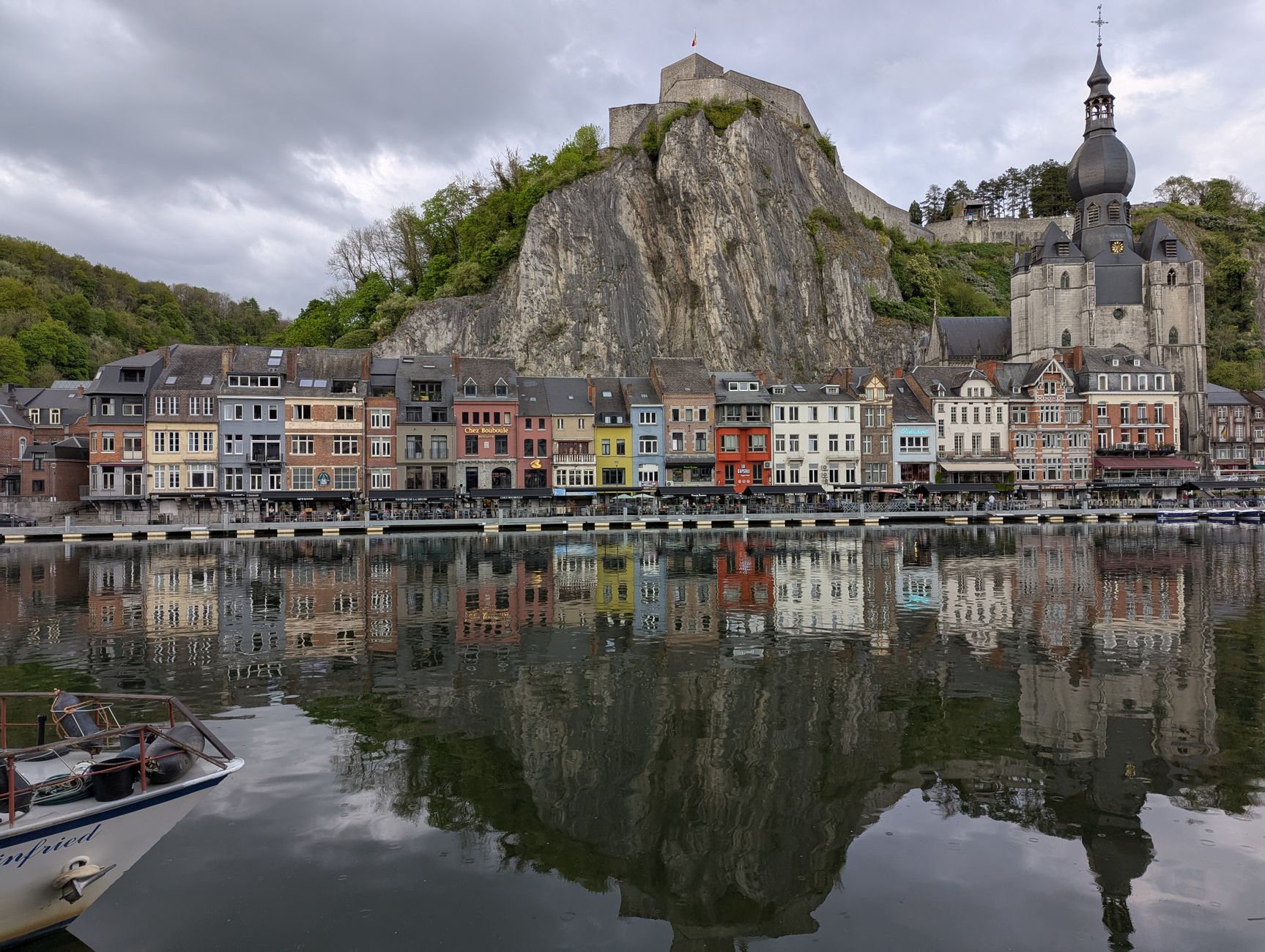 dinant belgium kayak canoe meuse river valley green water cliff adventure couple