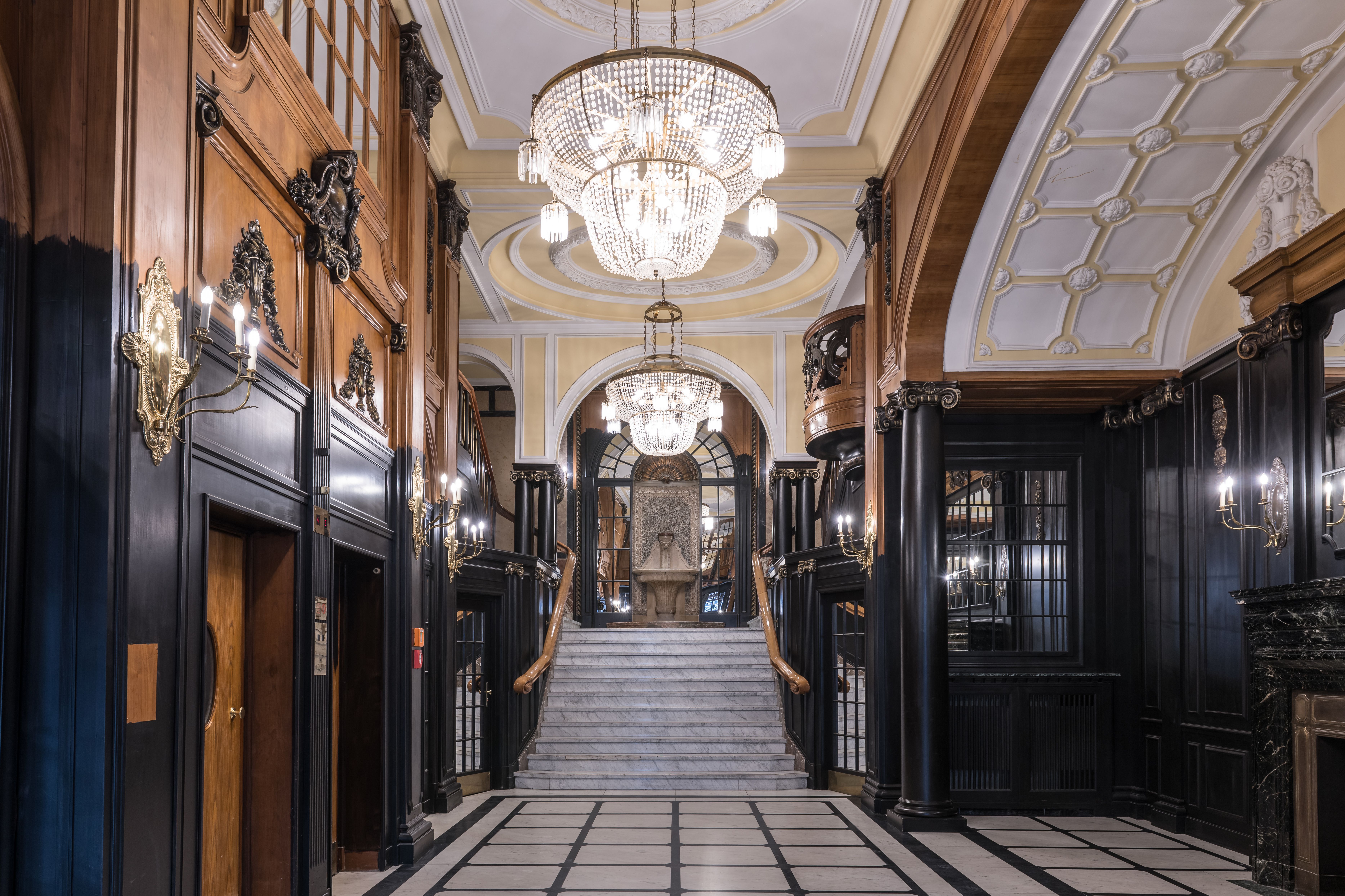 An apartment lobby and stairwell being renovated