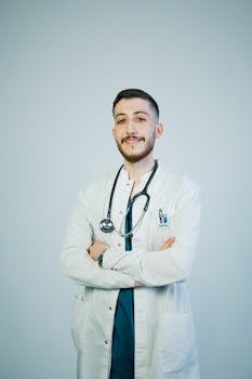 Portrait of a young male doctor with a stethoscope, exuding confidence and professionalism.