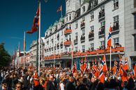 Vibrant street celebration in Oslo during Norwegian Constitution Day.