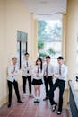 Group of Students in Uniform Posing Confidently