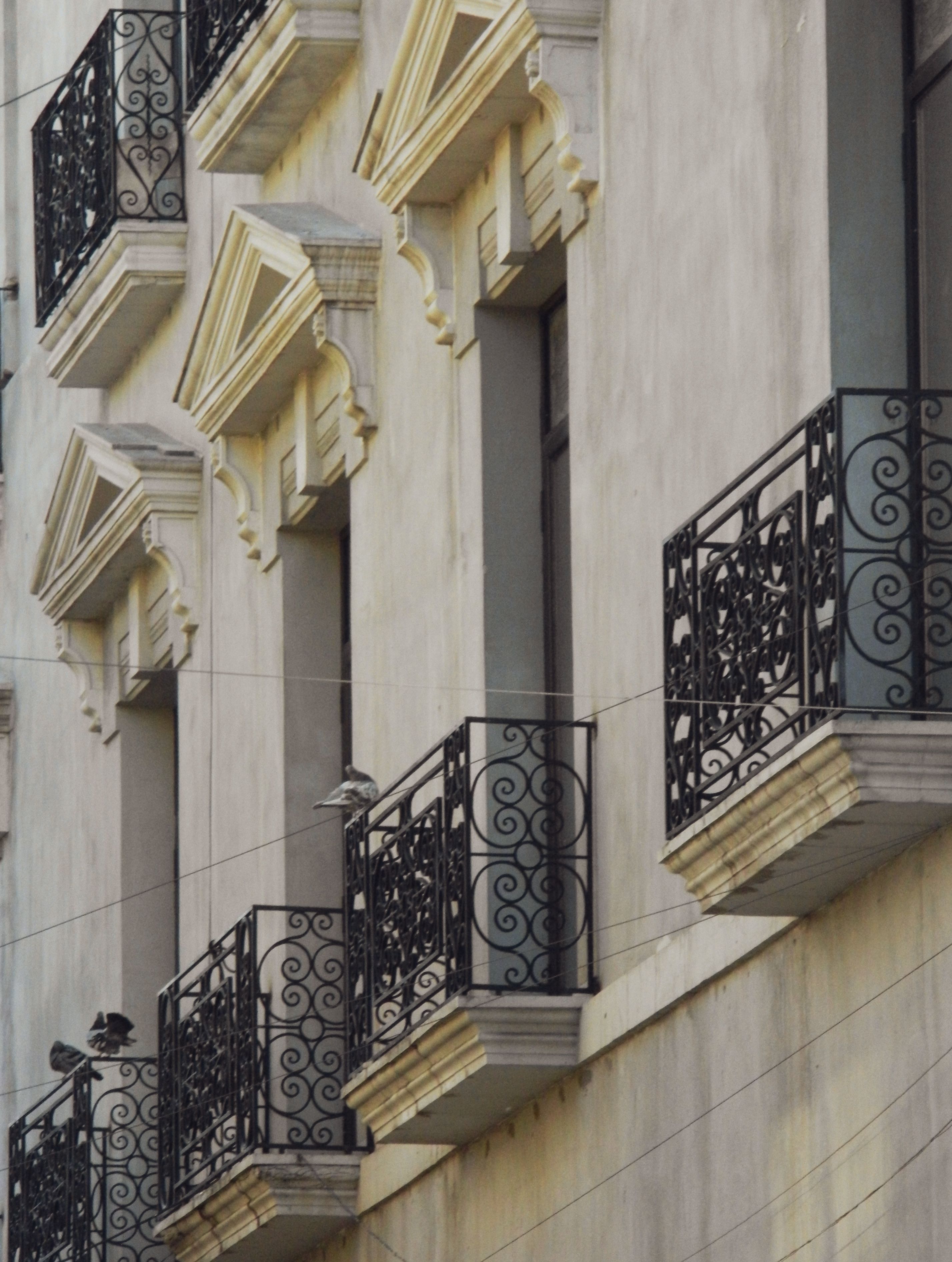 Elegant Urban Architecture with Iron Balconies · Free Stock Photo
