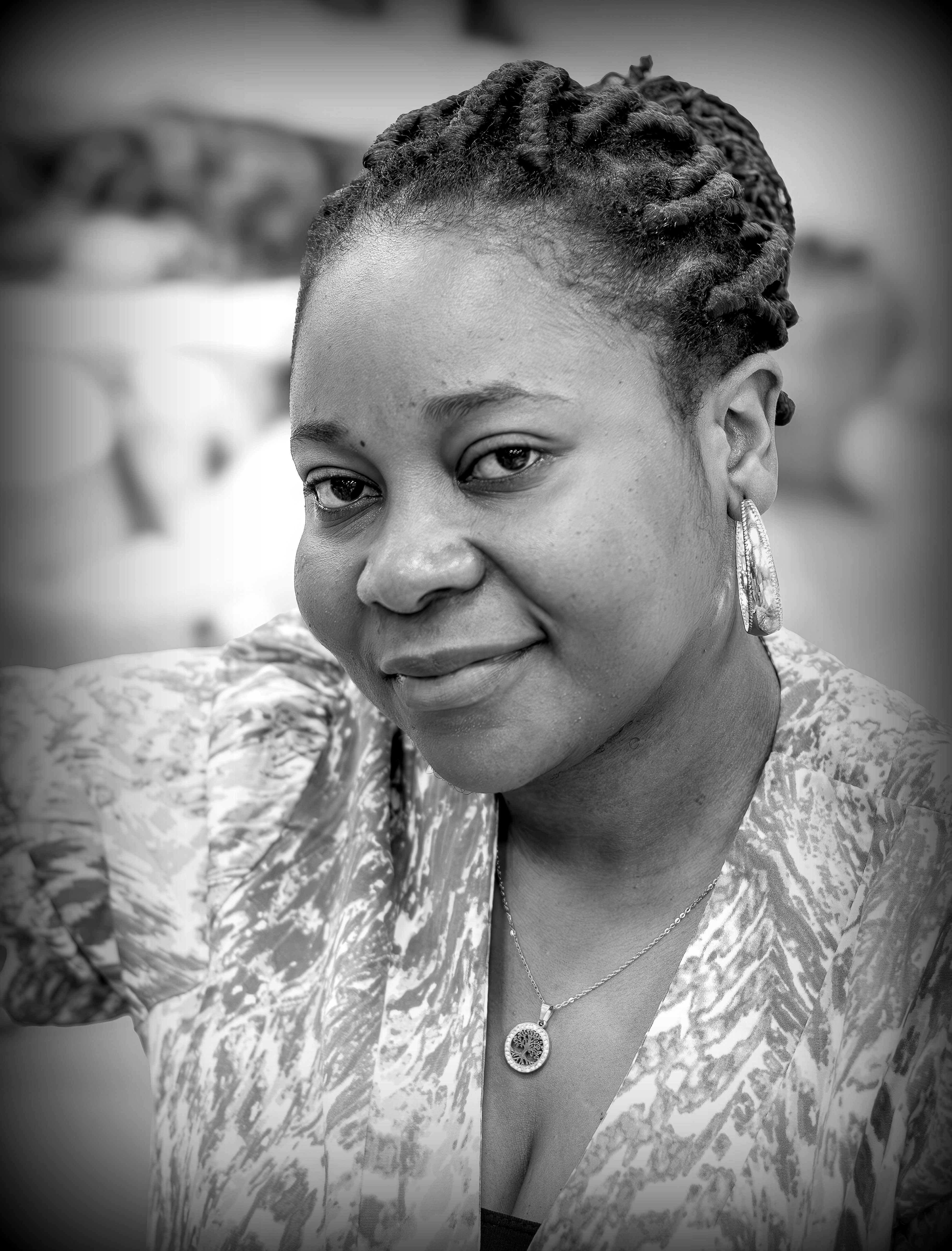 Black and White Portrait of a Smiling Woman · Free Stock Photo