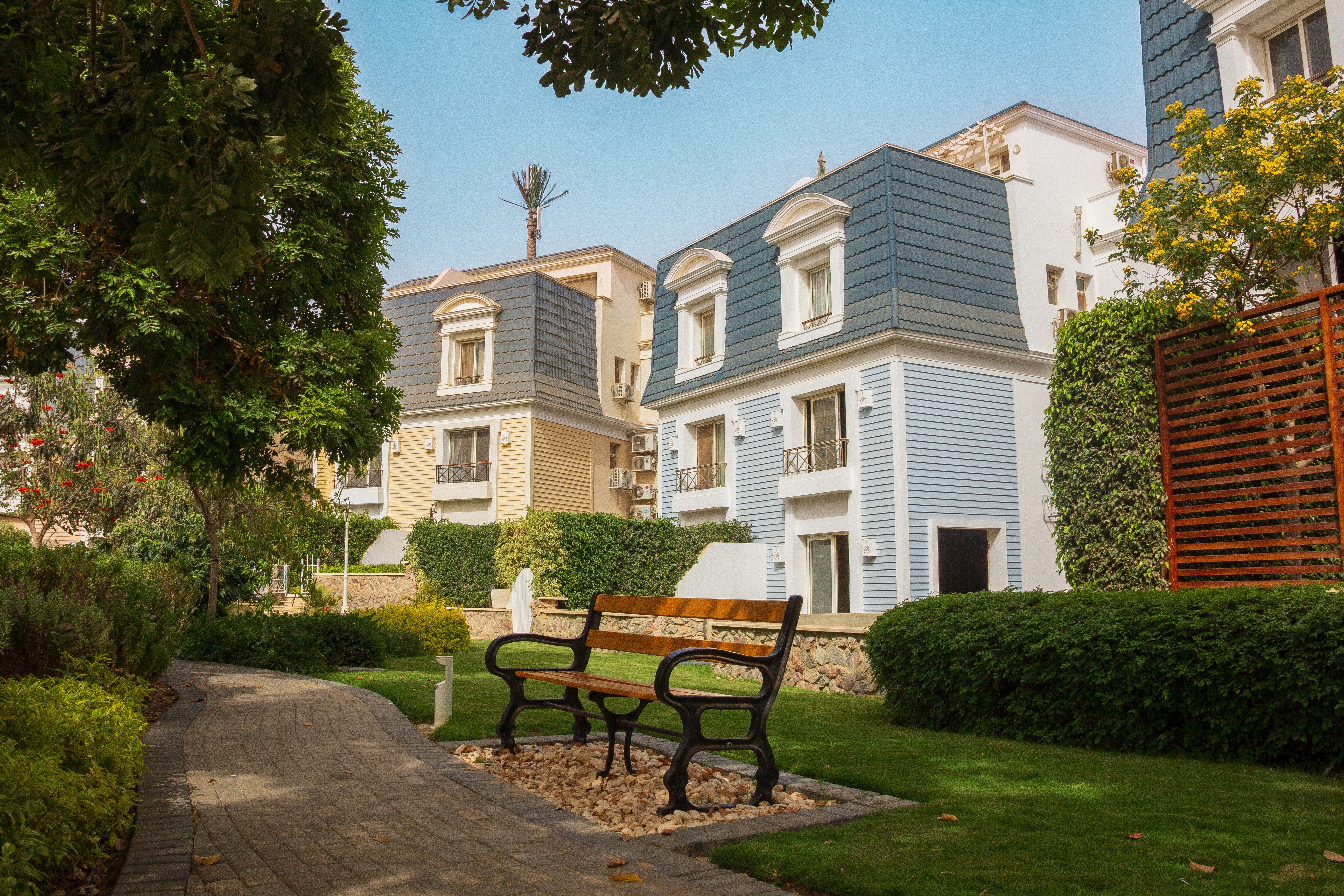 Contemporary Apartment Complex with Lush Garden · Free Stock Photo