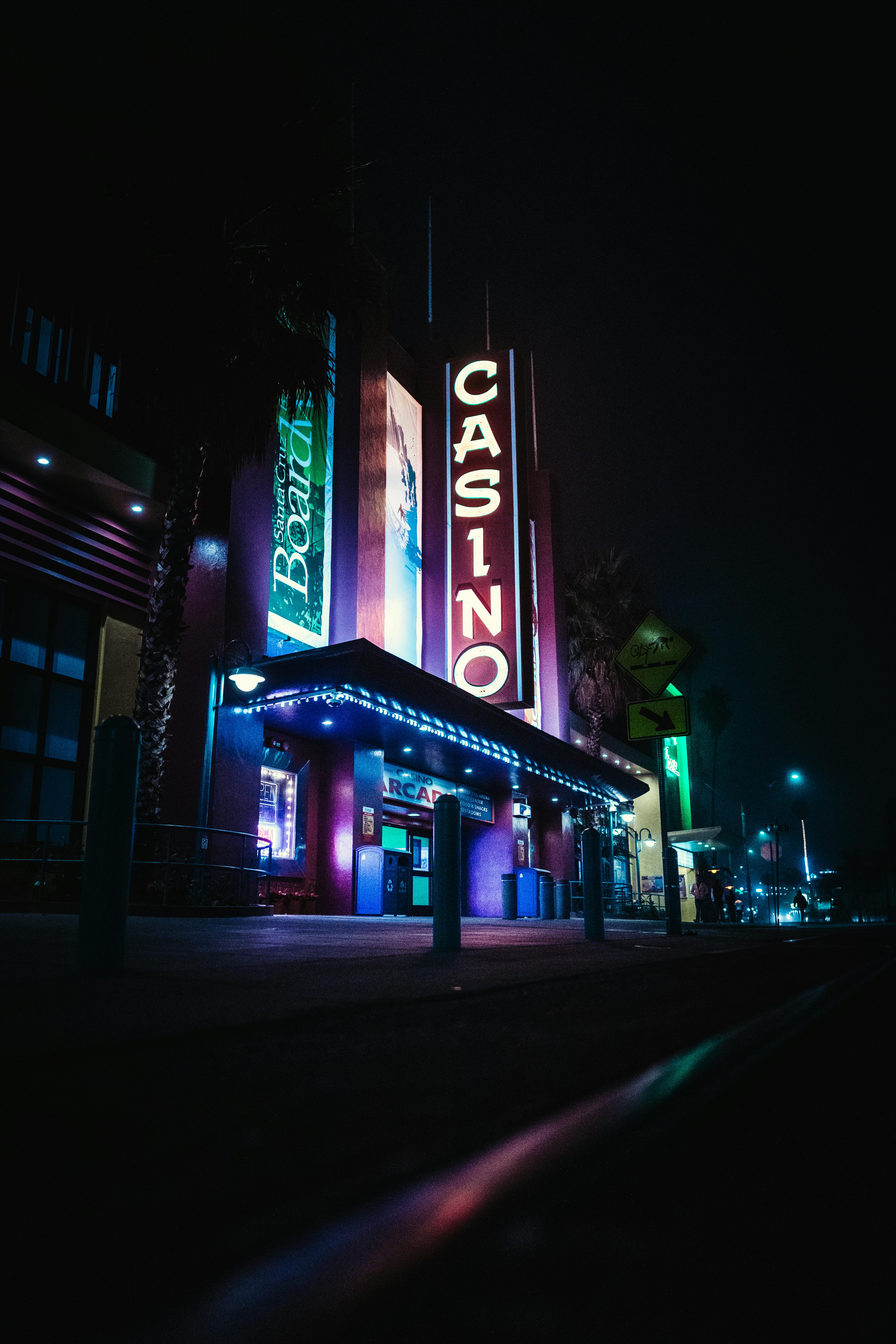 Casino building with neon signboards in dark night \u00b7 Free Stock Photo