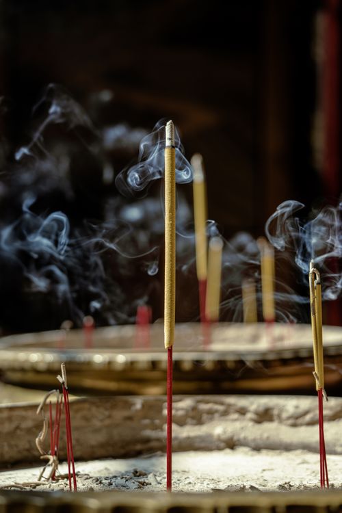Free Incense sticks burning in a pagoda in Ho Chi Minh City, Vietnam, signifying prayer and spirituality. Stock Photo