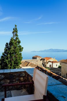 Charming Mediterranean village with sea view, vibrant rooftops, and a secluded terrace.