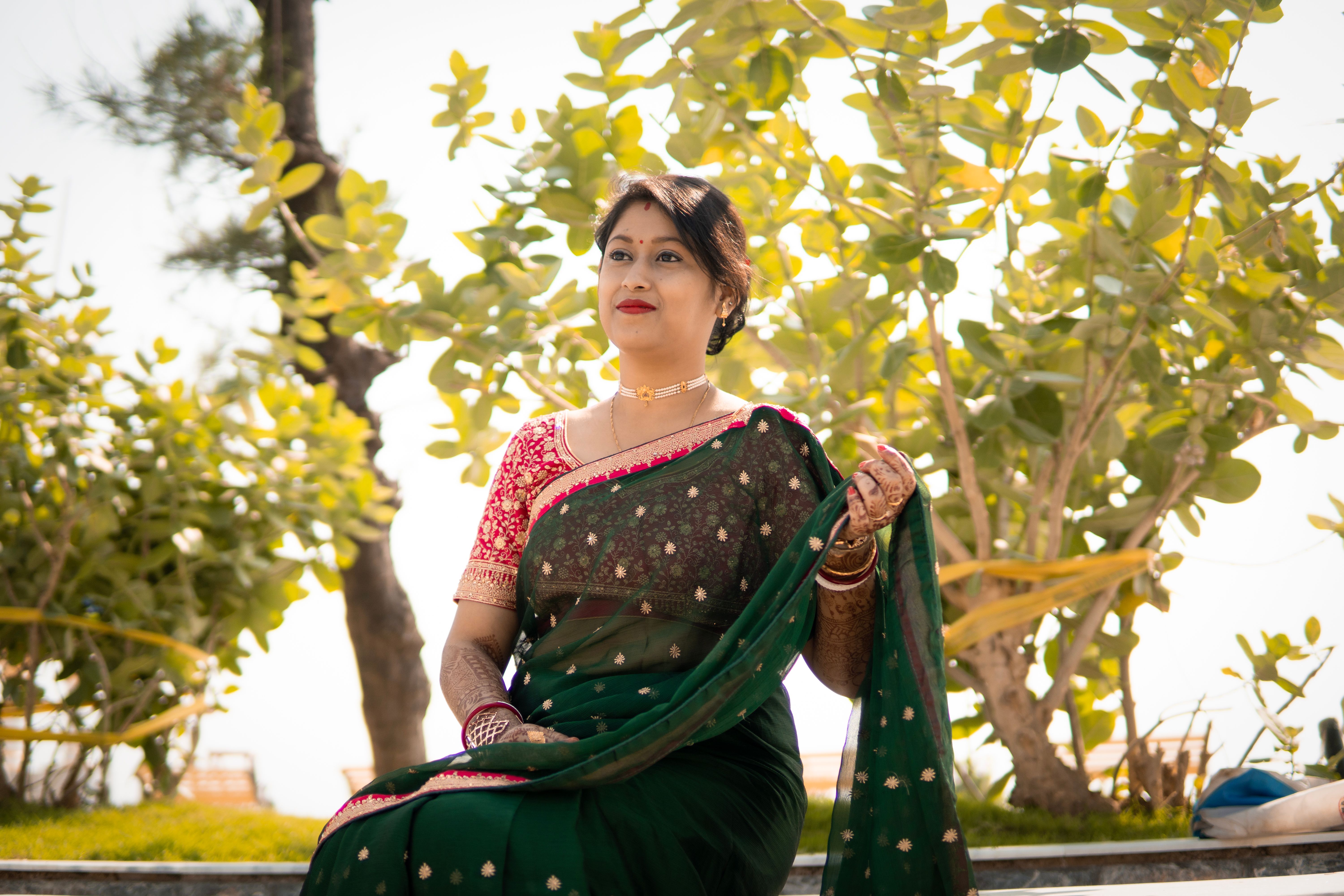 Elegant Woman in Traditional Indian Saree Outdoors · Free Stock Photo