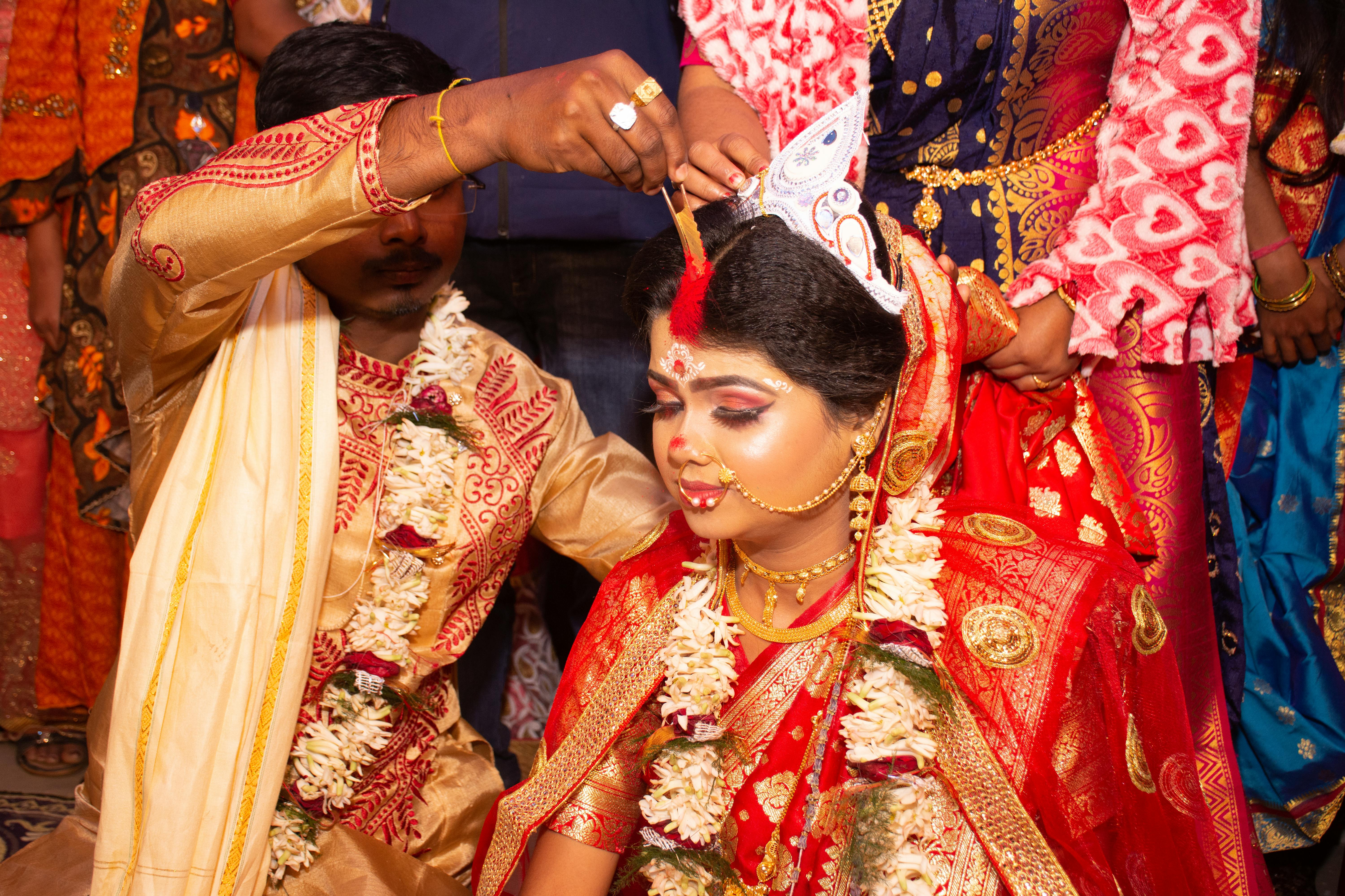 https://www.pexels.com/photo/indian-wedding-ceremony-with-traditional-rituals-32168685/