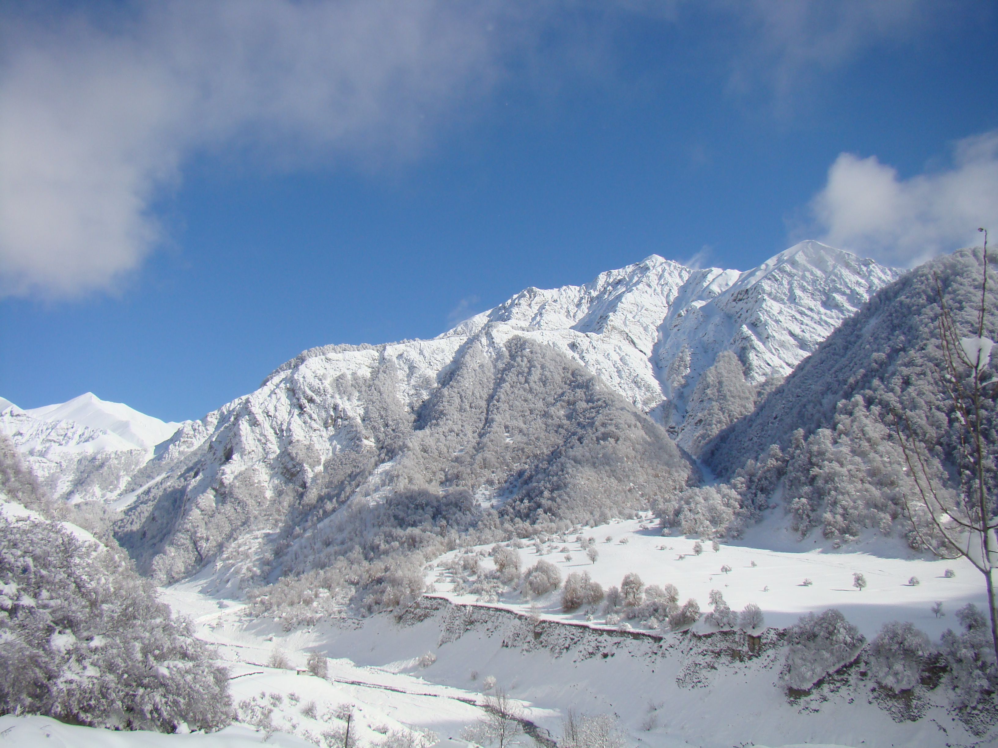 Snow-Covered Mountains Under Clear Blue Sky · Free Stock Photo