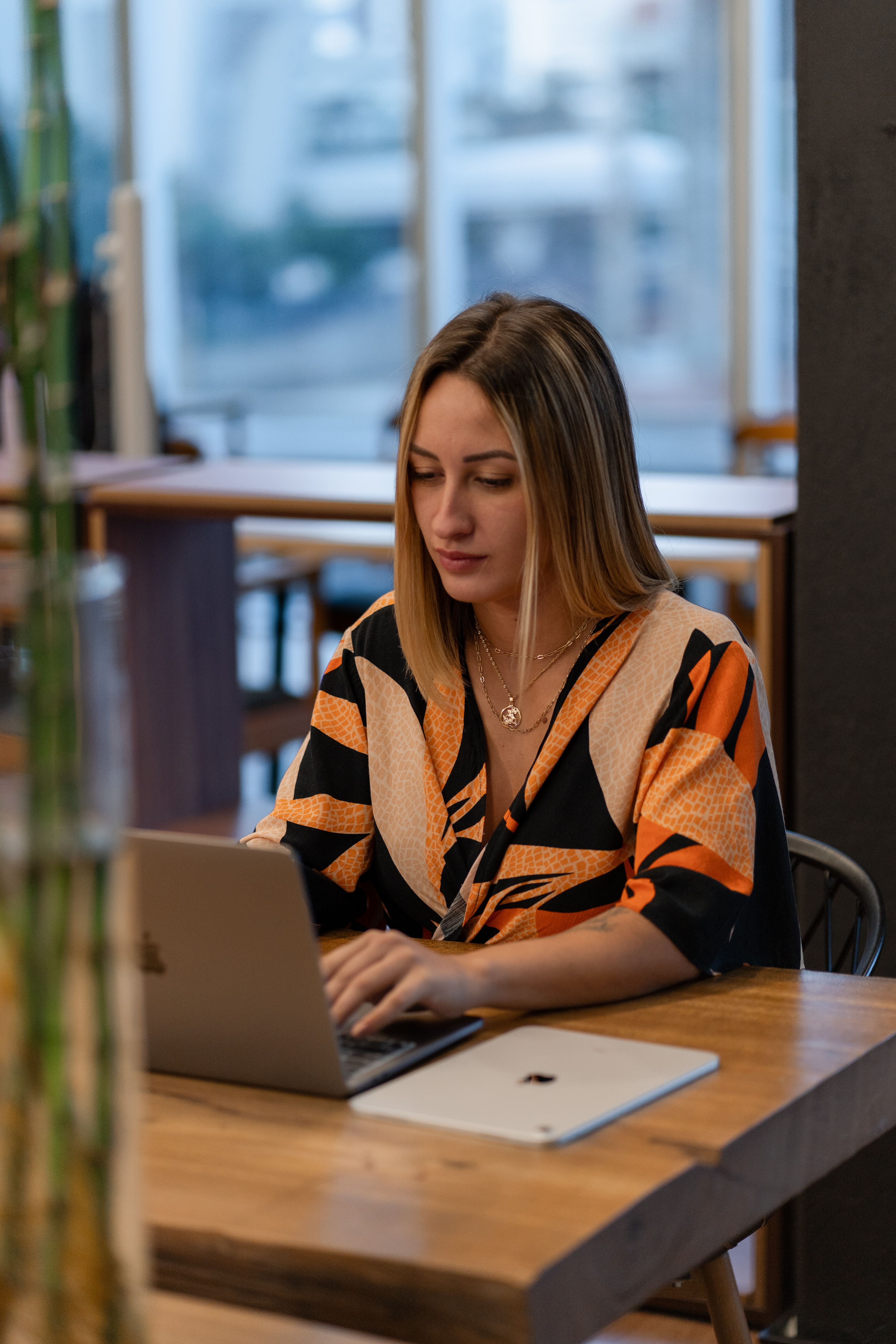 Professional businesswoman working naturally on a laptop