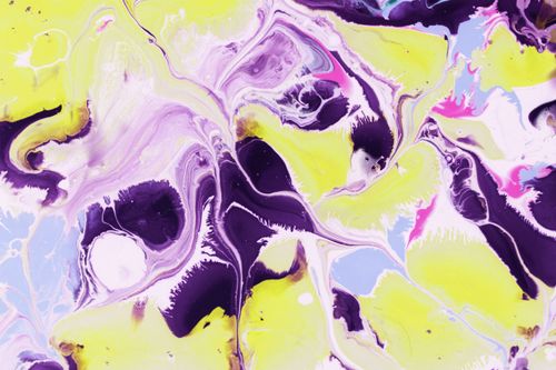 Free Dynamic abstract fluid artwork showcasing vibrant swirls of purple and yellow hues. Stock Photo
