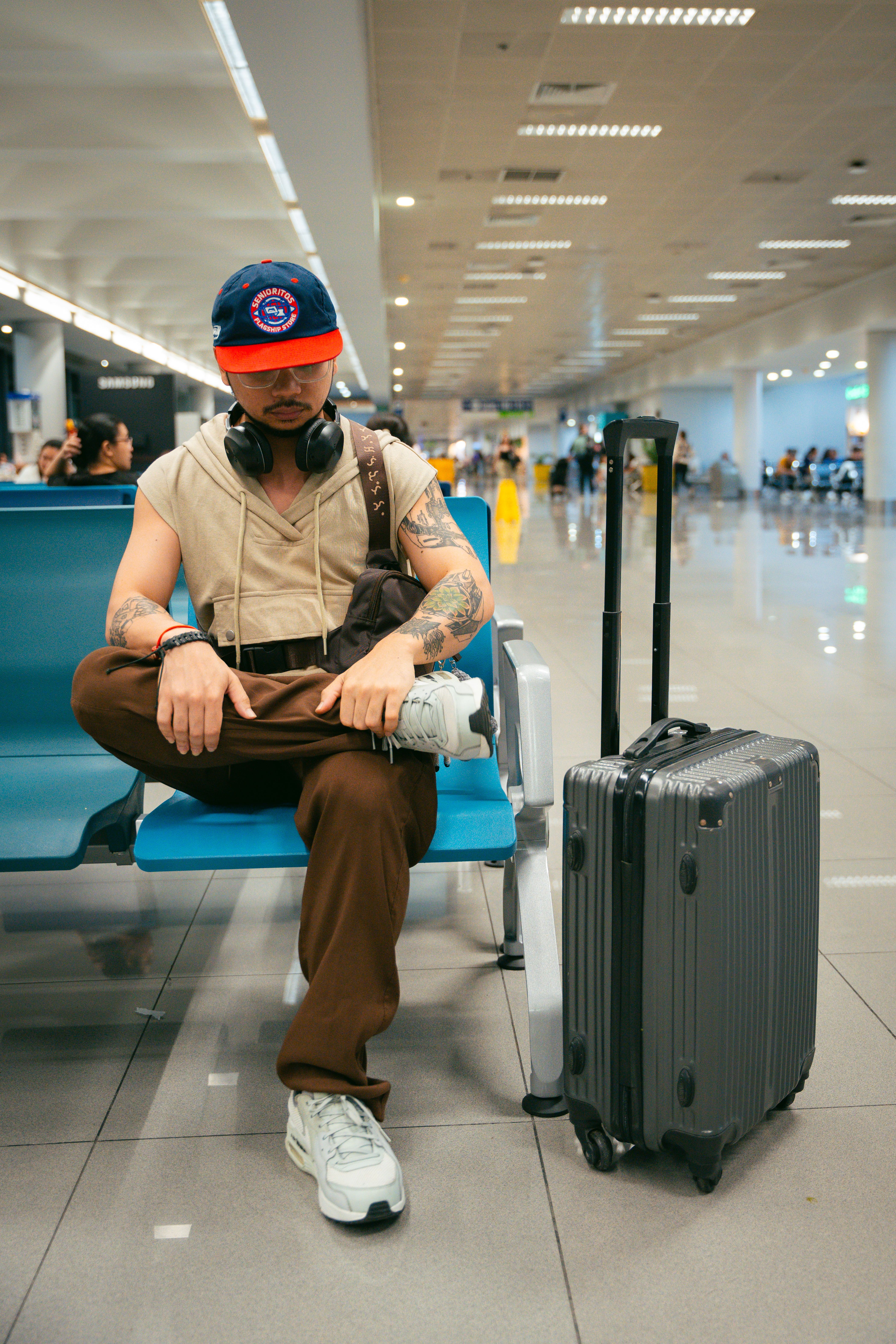 Solo traveller with backpack looking at scenic destination
